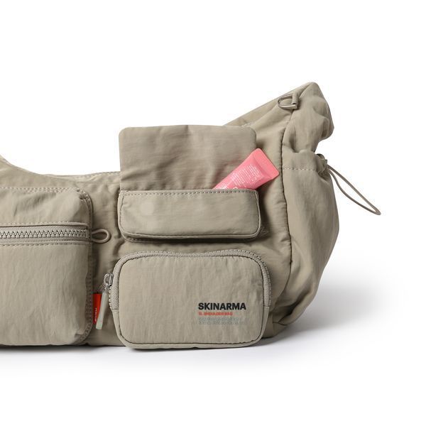 Сумка Skinarma Jax Crescent Bag (Small) Beige SK-CRESCENT-S-JAX-BGE фото